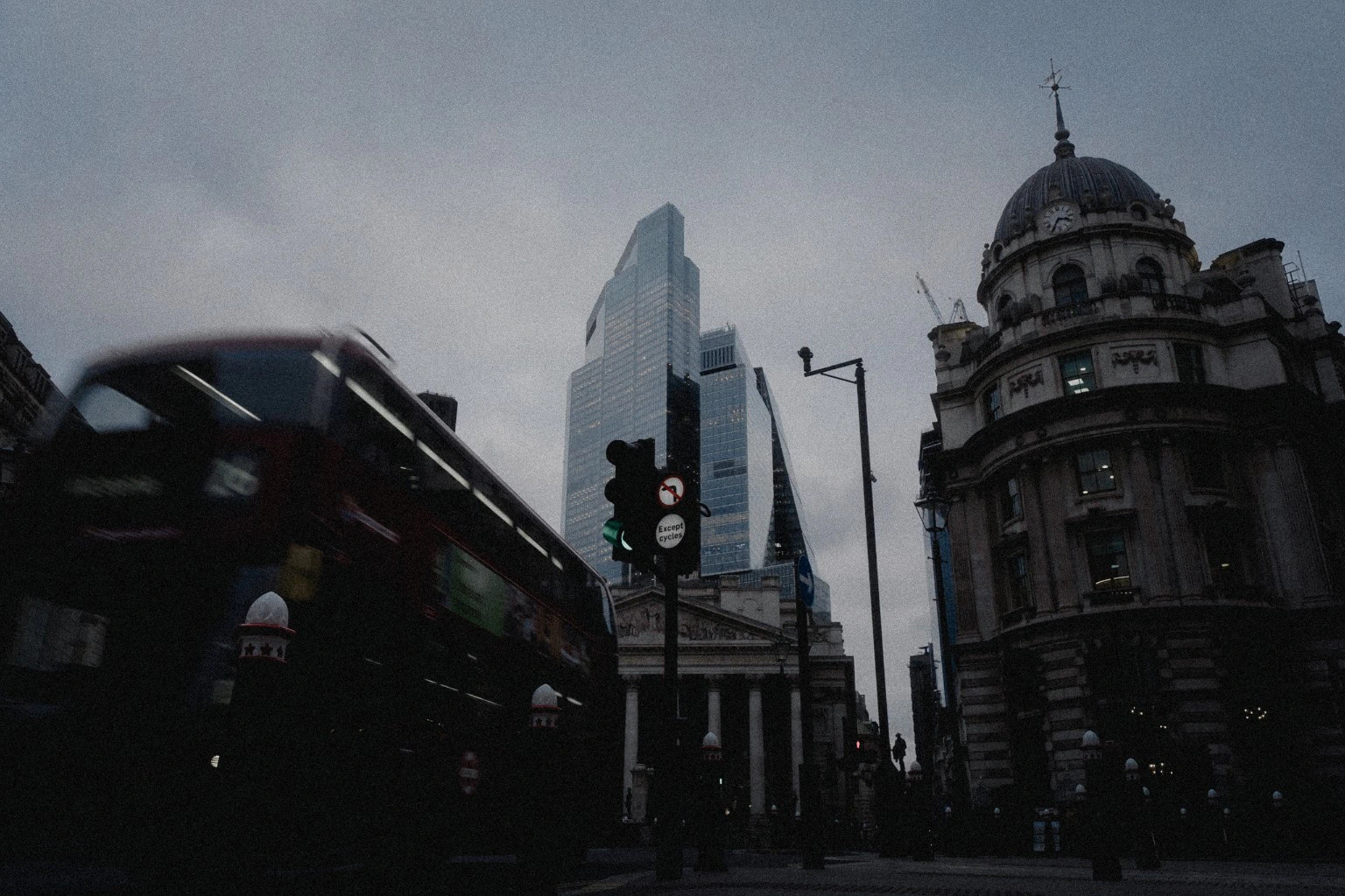 London bus crossing an architectural city view