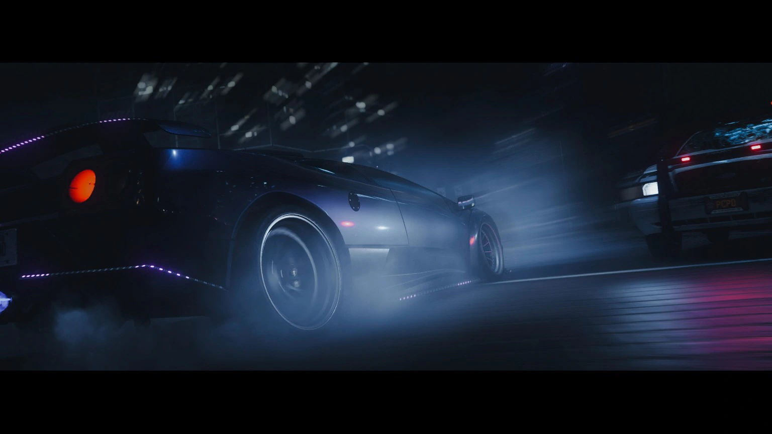Sports car in a cinematic night-time police chase