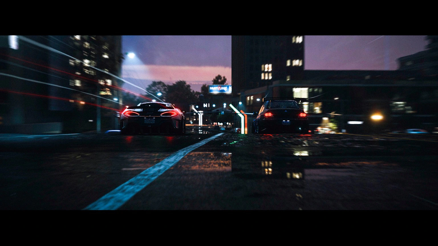 Two cars racing along a wet city street at dusk