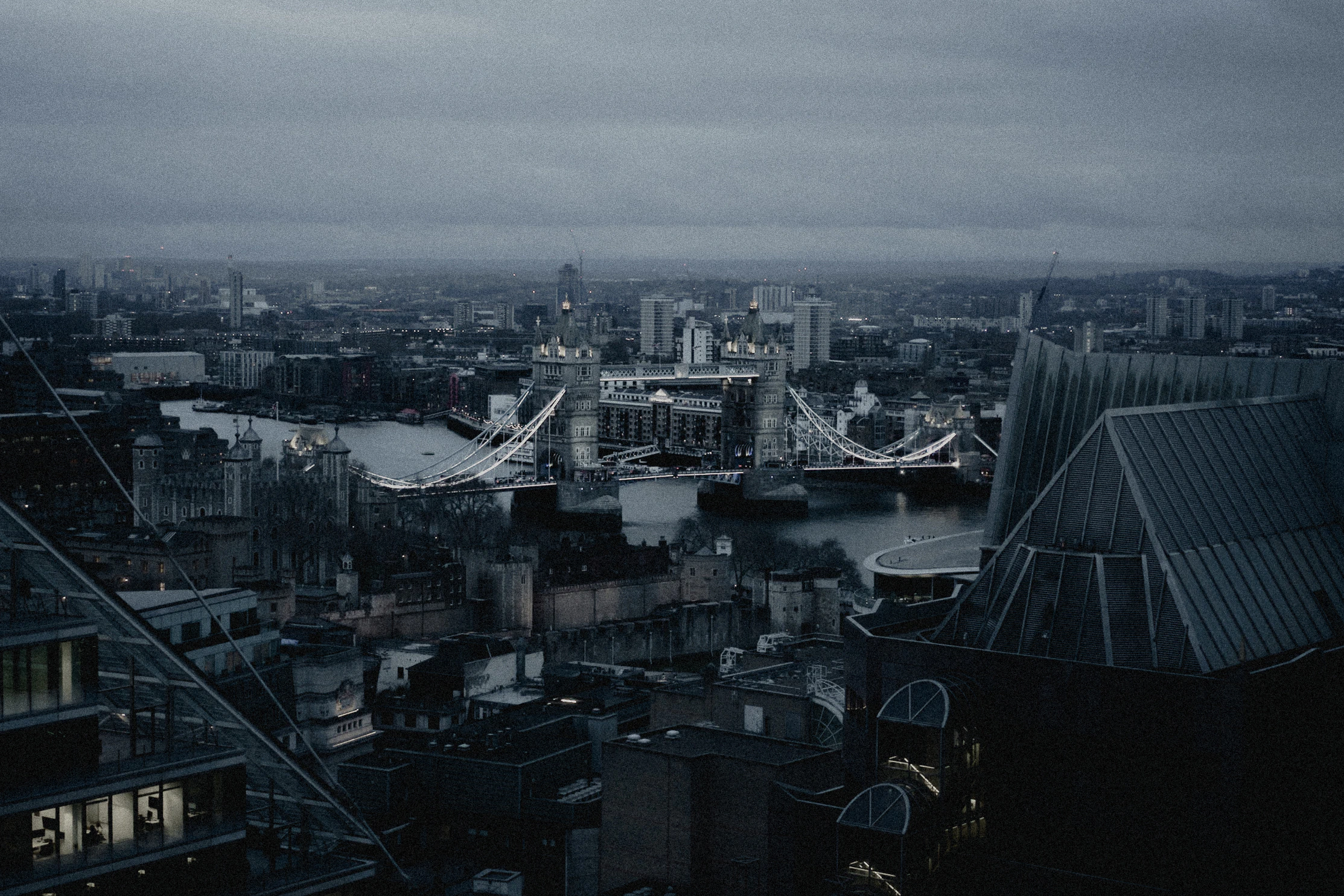 Tower Bridge and the London skyline under low cloud